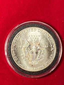 1987-P Silver Eagle dollar, one oz. fine silver.