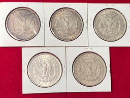 (5) Morgan silver dollars. Bid times five.