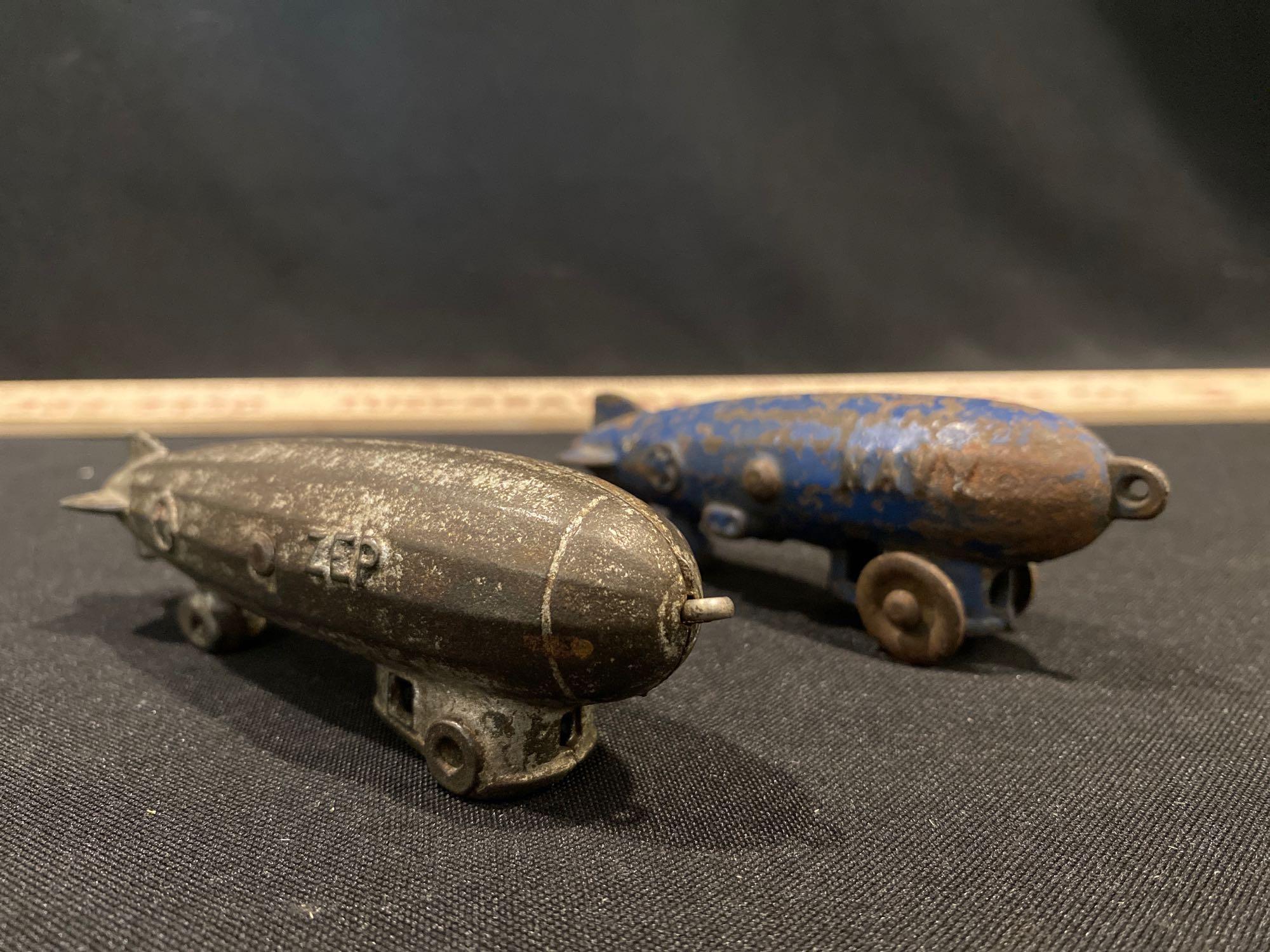 Cast-iron Zeppelin, airship, dirigible toys 1 says Zep, 1 says Navy