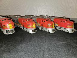 (4) Lionel Santa Fe Engines, (1) Train Car