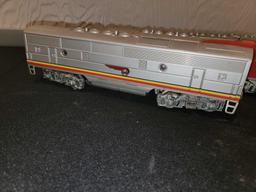 (4) Lionel Santa Fe Engines, (1) Train Car