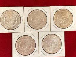 (5) Morgan silver dollars, AU grade. Bid times five.