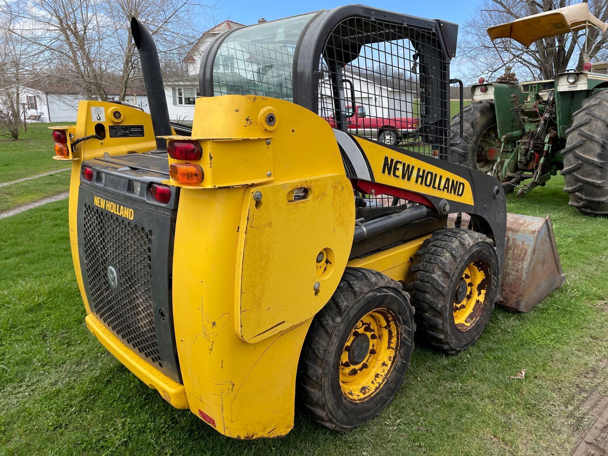 2012 NH L213 skid steer with mat. bucket, manure forks and homemade pallet forks, 2300 hours