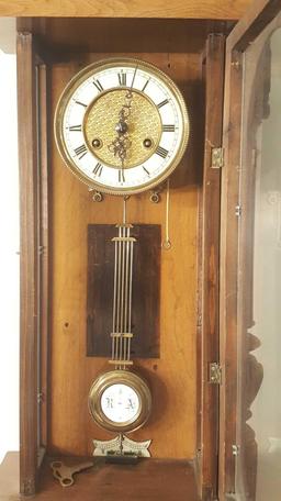 Antique wall clock, fancy case, running