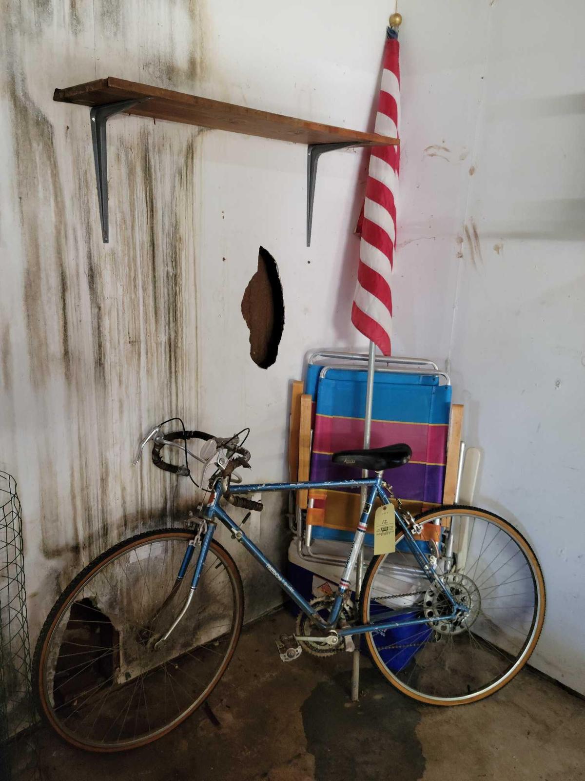 Bike, cooler, beach chairs, flag