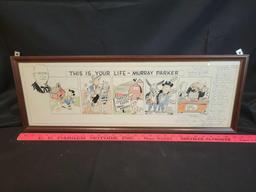 Murray Parker frames print with signatures