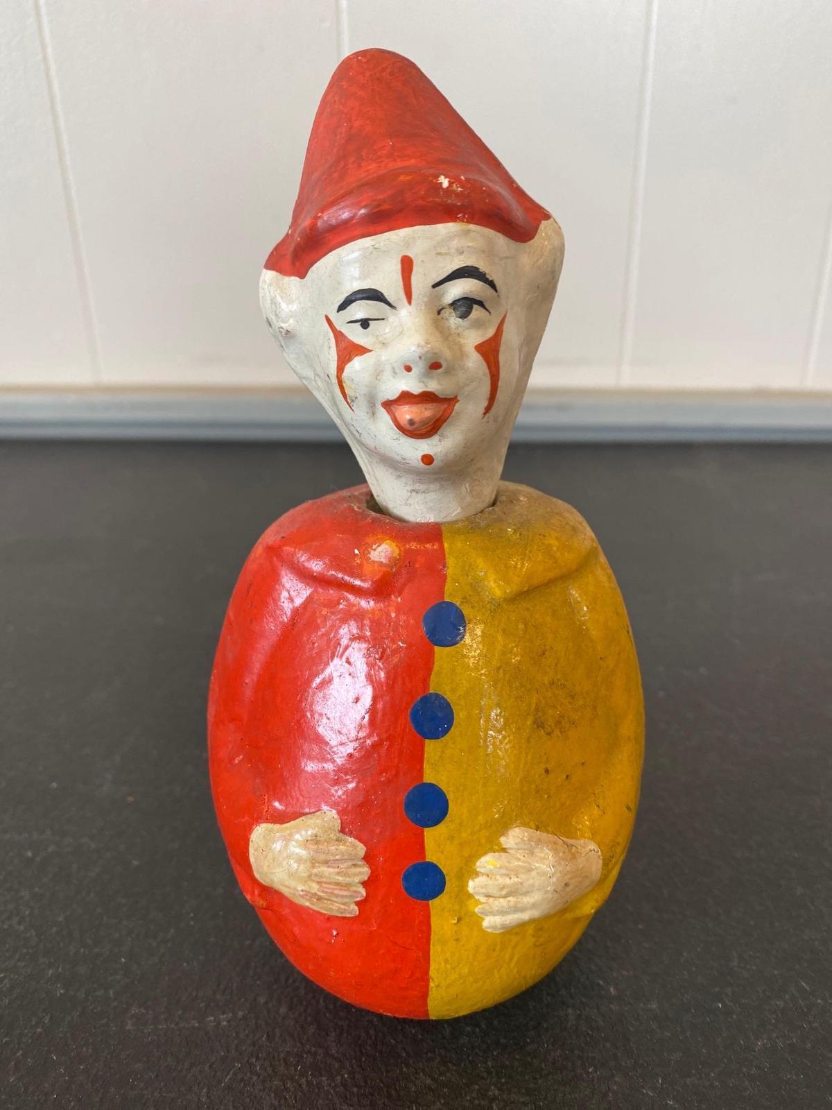 Hand painted composition clown, roly poly style, 7" tall.