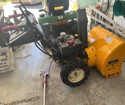 Cub Cadet snow blower with tire chains