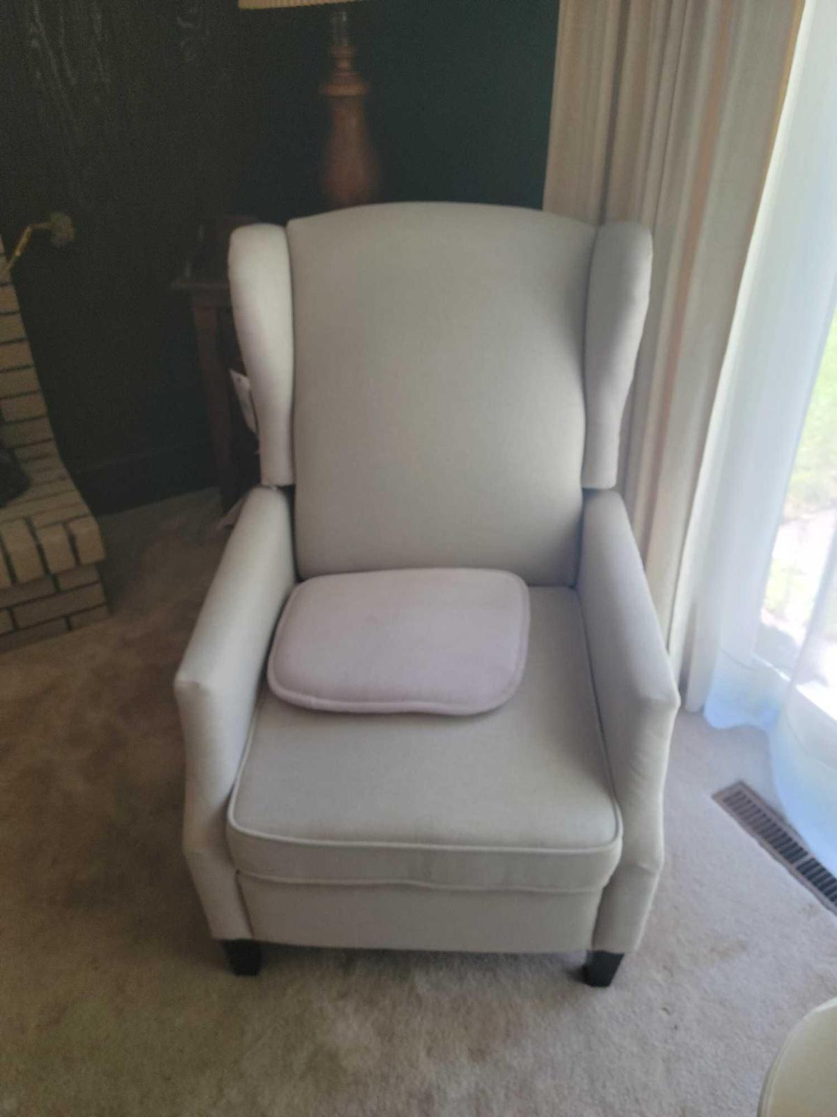 Modern wingback reclining chair with nail trim
