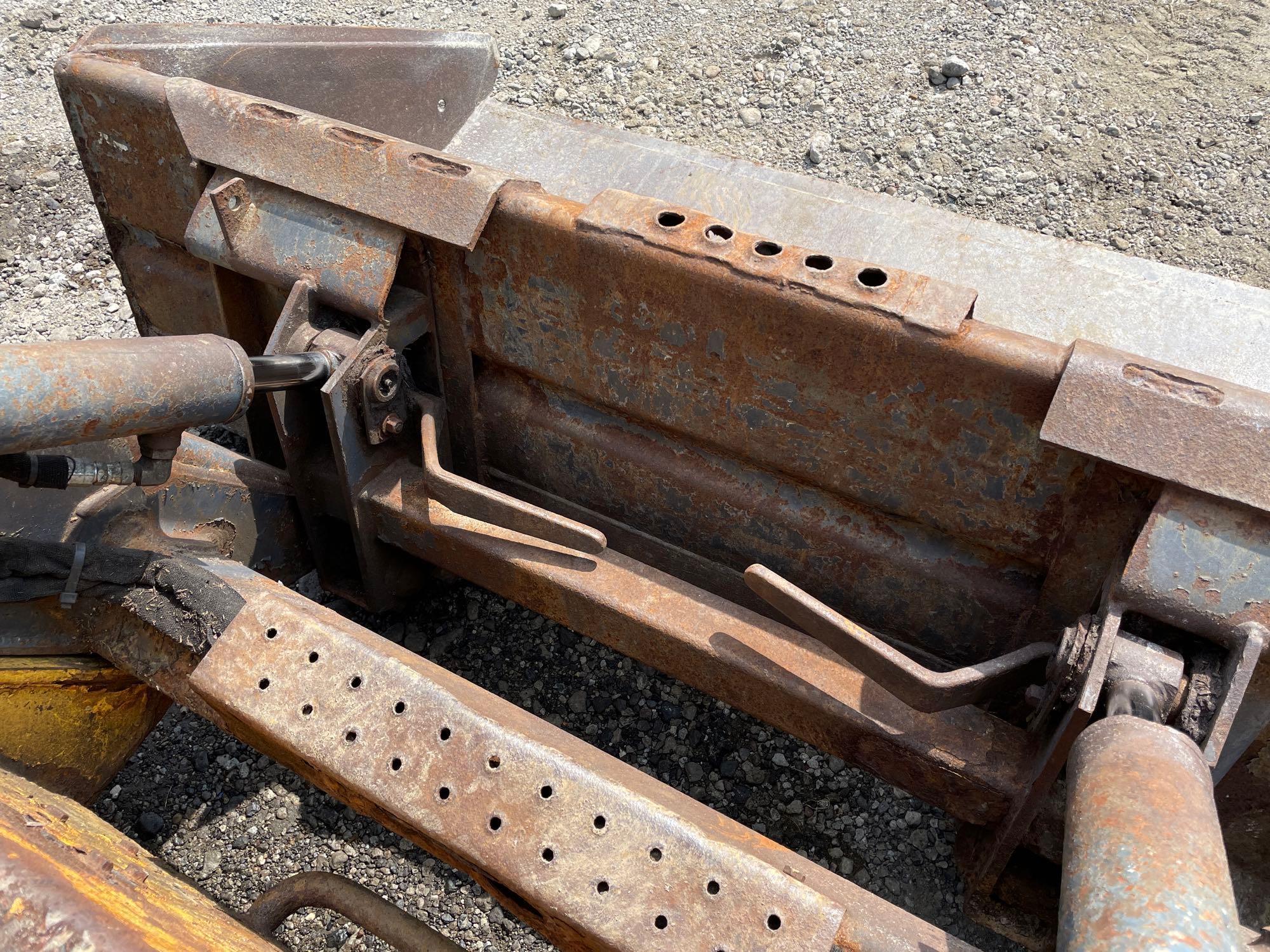 New Holland LS170 skid steer with 66in quick tack bucket