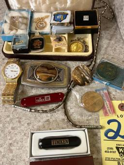 Mens Jewelry including pins, watch, bolo tie, buckle, necklace, coins, pocket watch, measure tape,