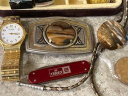 Mens Jewelry including pins, watch, bolo tie, buckle, necklace, coins, pocket watch, measure tape,