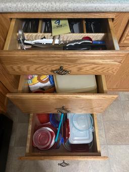 Flatware, Tupperware, Kitchen towels, bakeware, mixing bowls, cutting boards, toaster, utensils,