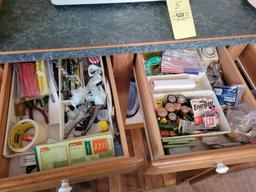 Contents of kitchen cabinets, pots, pans, junk drawers, covered corningware