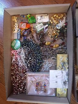 Assortment of costume jewelry - necklaces, earrings, pins, bracelets