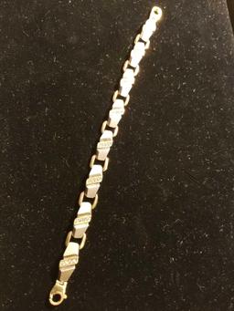 14k man's yellow and white link 8 in long bracelet
