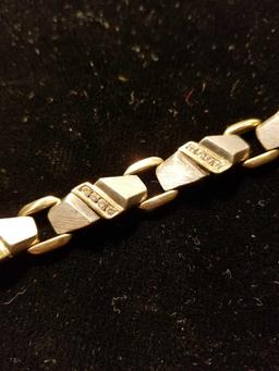 14k man's yellow and white link 8 in long bracelet