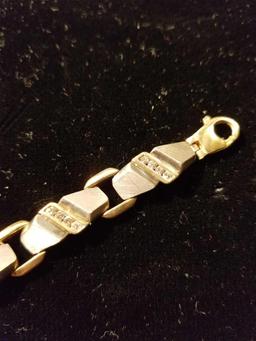 14k man's yellow and white link 8 in long bracelet
