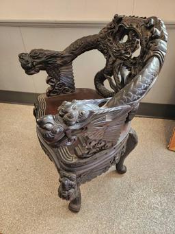 Profusely carved vintage Chinese dragon chair