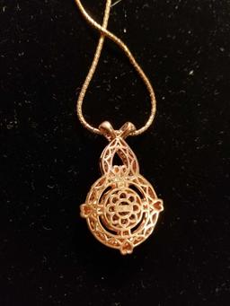 14k gold necklace, pendent with small diamonds, 18.1 grams