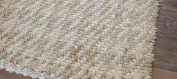 Natural fiber woven area rug