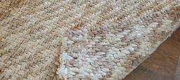 Natural fiber woven area rug