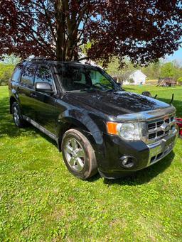 2009 Ford Escape 4-Door Auto,Black interior with Heated Leather seats ,shows 100,775 miles