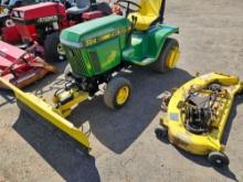 John Deere 322 mower with blade and deck
