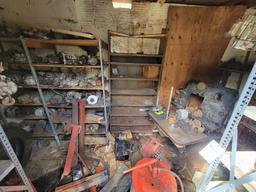 Contents of building, carburetors, engine stand, motor, scaffolding pieces, and more