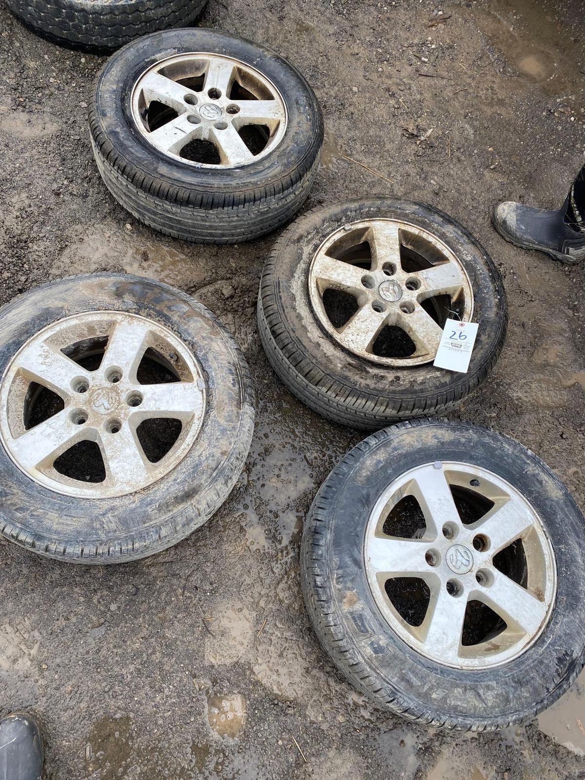 (4) rims and tires off 2010 grand caravan