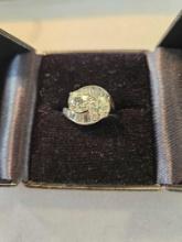 Lady's platinum diamond ring with 2 old European cut center diamonds