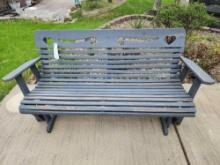 Wooden patio rocker and plastic bench