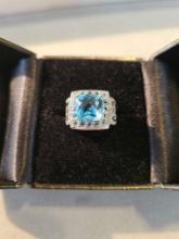 Lady's 14k white gold ring with blue topaz