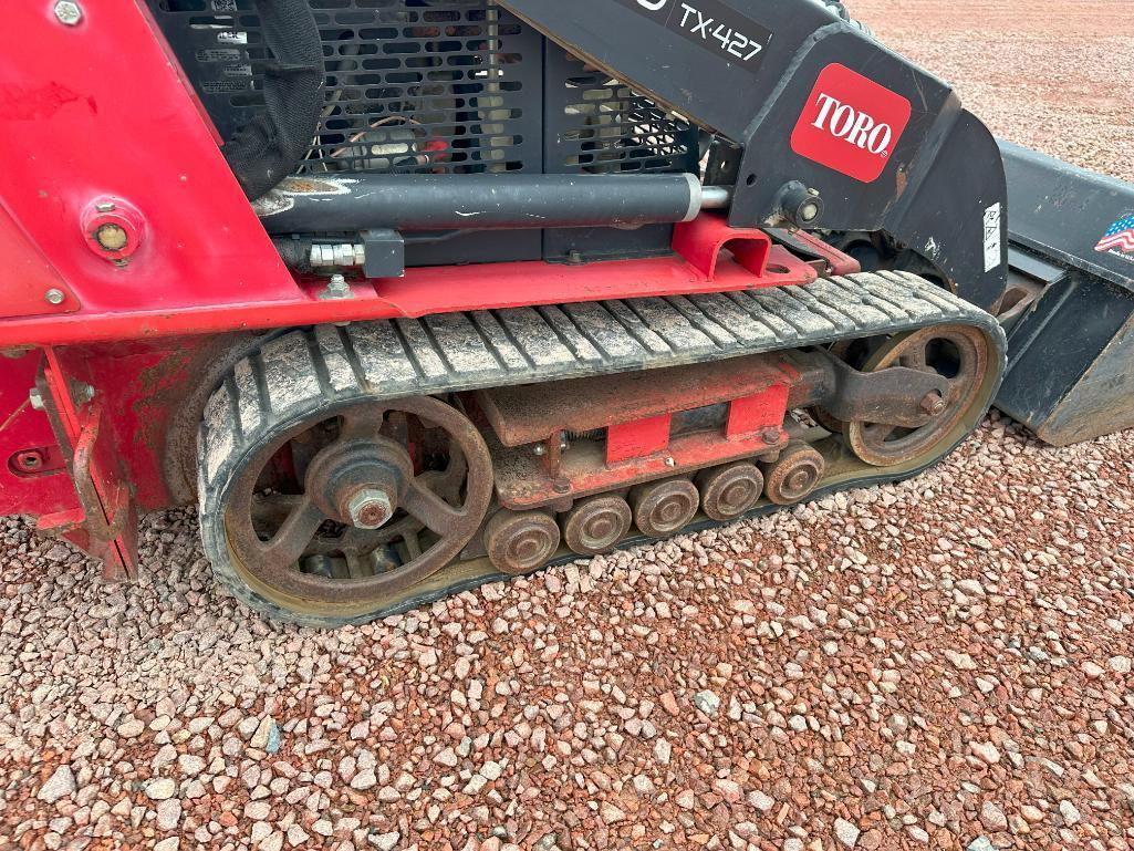 2013 Toro Dingo TX427 walk behind track skid steer, Kohler gas engine, 6" rubber tracks, bucket, aux