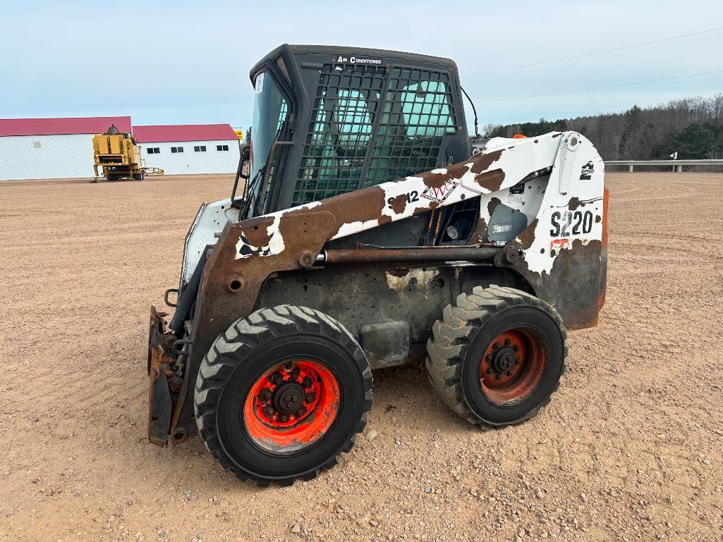 Bobcat S220 skid steer, cab w/AC, aux hyds, hand & foot controls, 12x16.5 tires, drive motors