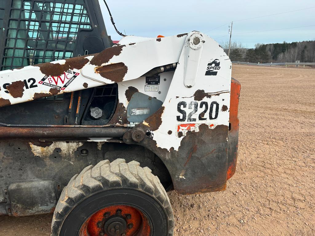 Bobcat S220 skid steer, cab w/AC, aux hyds, hand & foot controls, 12x16.5 tires, drive motors