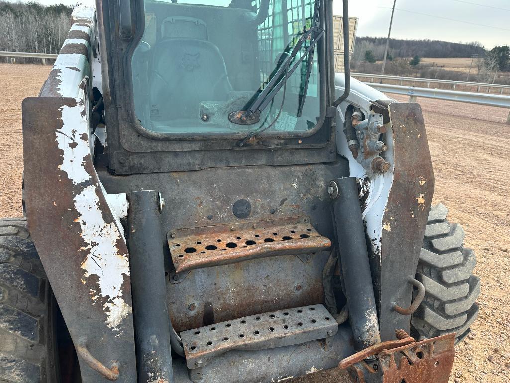 Bobcat S220 skid steer, cab w/AC, aux hyds, hand & foot controls, 12x16.5 tires, drive motors