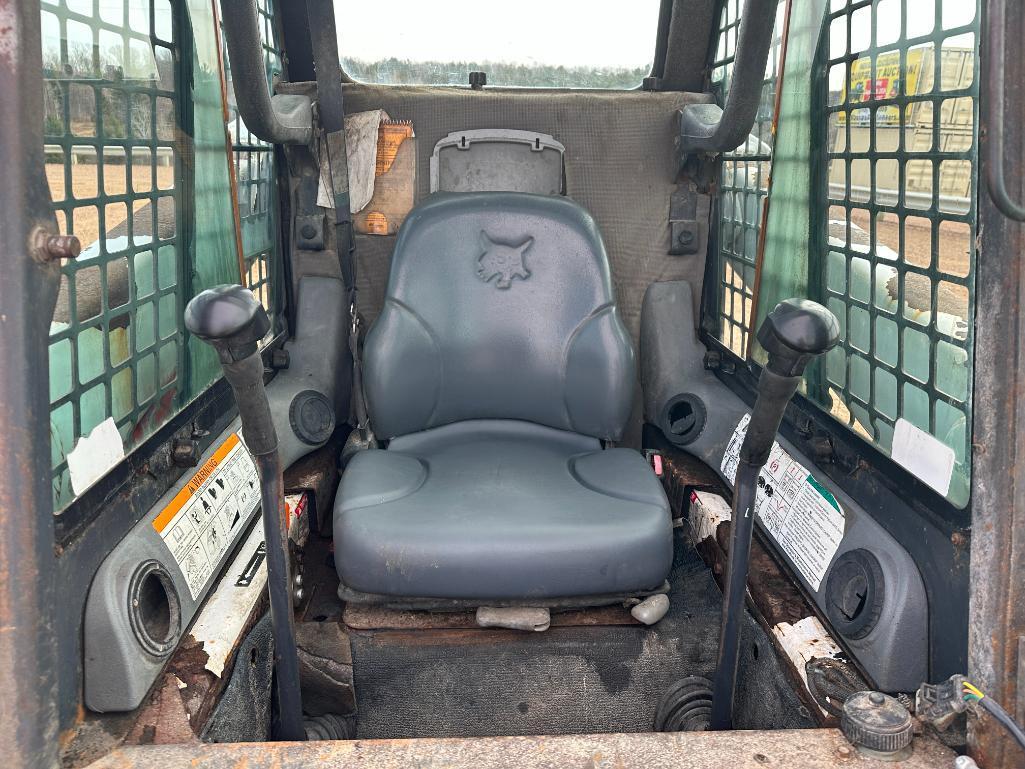 Bobcat S220 skid steer, cab w/AC, aux hyds, hand & foot controls, 12x16.5 tires, drive motors