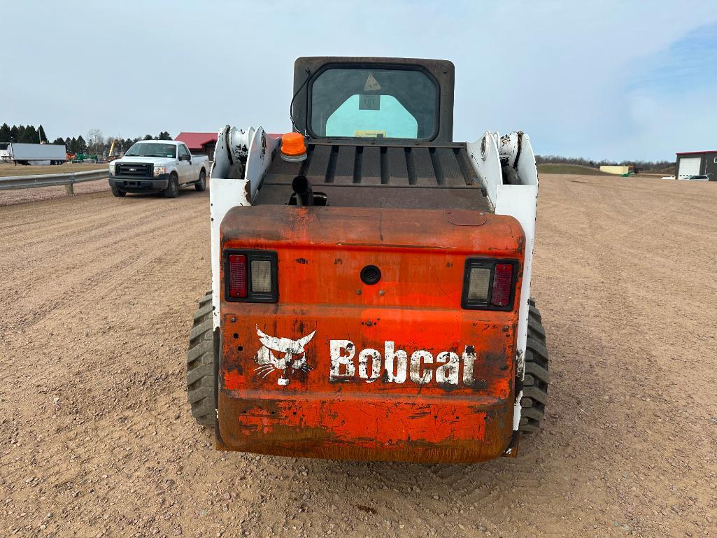 Bobcat S220 skid steer, cab w/AC, aux hyds, hand & foot controls, 12x16.5 tires, drive motors