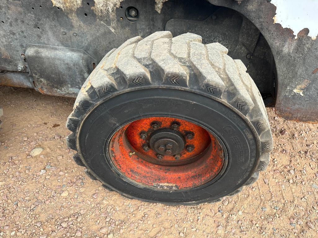 Bobcat S220 skid steer, cab w/AC, aux hyds, hand & foot controls, 12x16.5 tires, drive motors