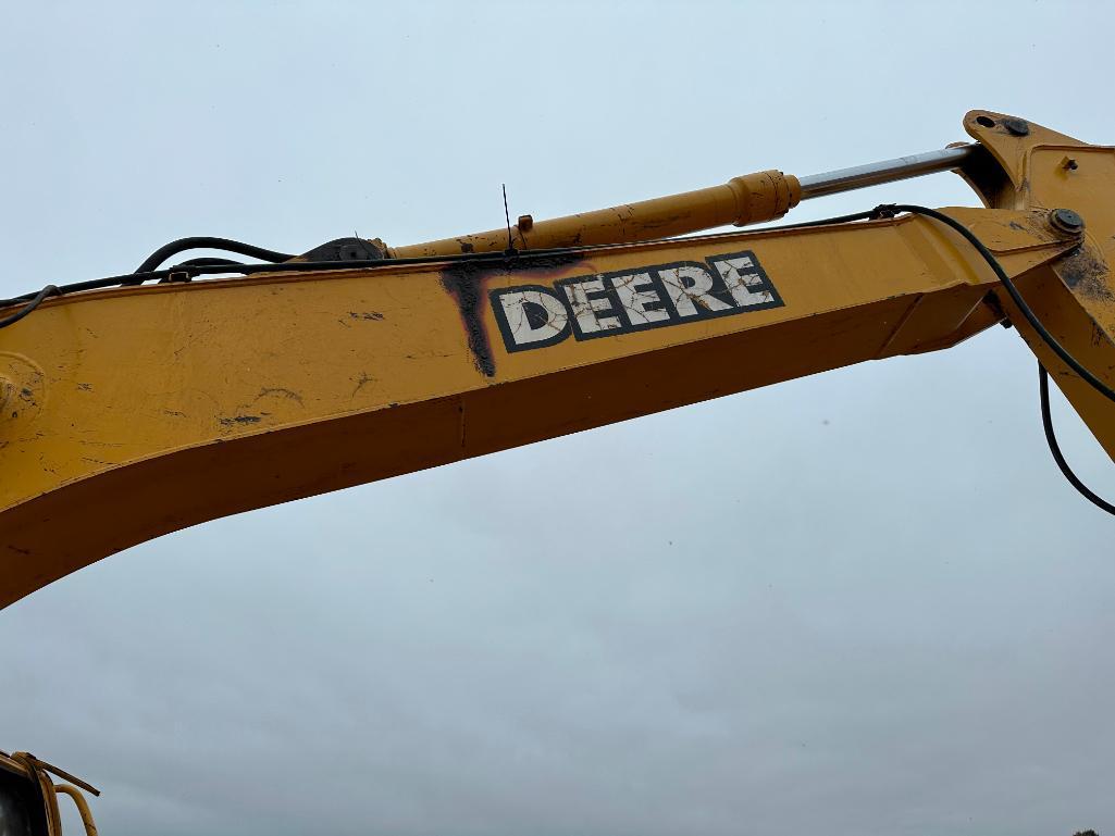 1997 John Deere 120 excavator, cab w/heat, 27 1/2" track pads, 36" bucket, manual thumb, runs &