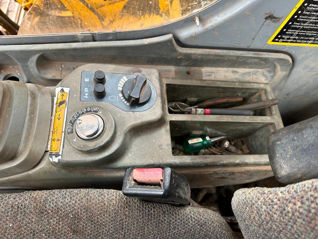 1997 John Deere 120 excavator, cab w/heat, 27 1/2" track pads, 36" bucket, manual thumb, runs &
