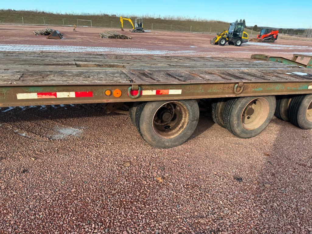 (TITLE) 1998 Dynaweld 102"x29' tri axle flatbed tag trailer, 30 ton capacity, 24' deck, 5'