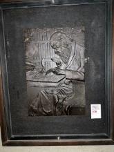 Antique looks like hand carved wood in frame