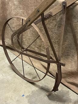 Antique Iron Wheel and Wood Handle Push Plow