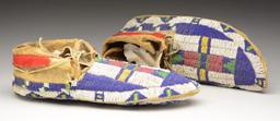 PAIR FULLY BEADED NATIVE AMERICAN MOCCASINS.