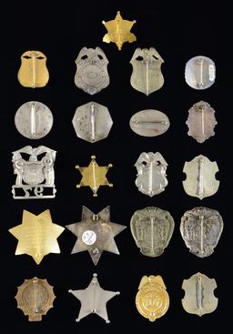 GROUP OF 21 POLICE & LAW ENFORCEMENT BADGES.