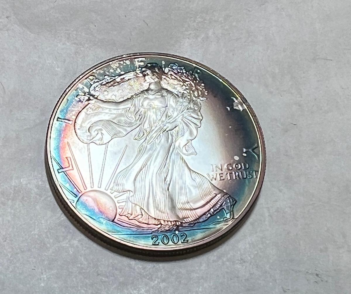 2002 1 oz. Silver American Eagle $1 BU Rainbow Toning