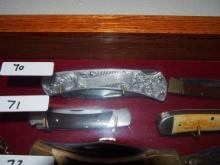 Silver folding knife