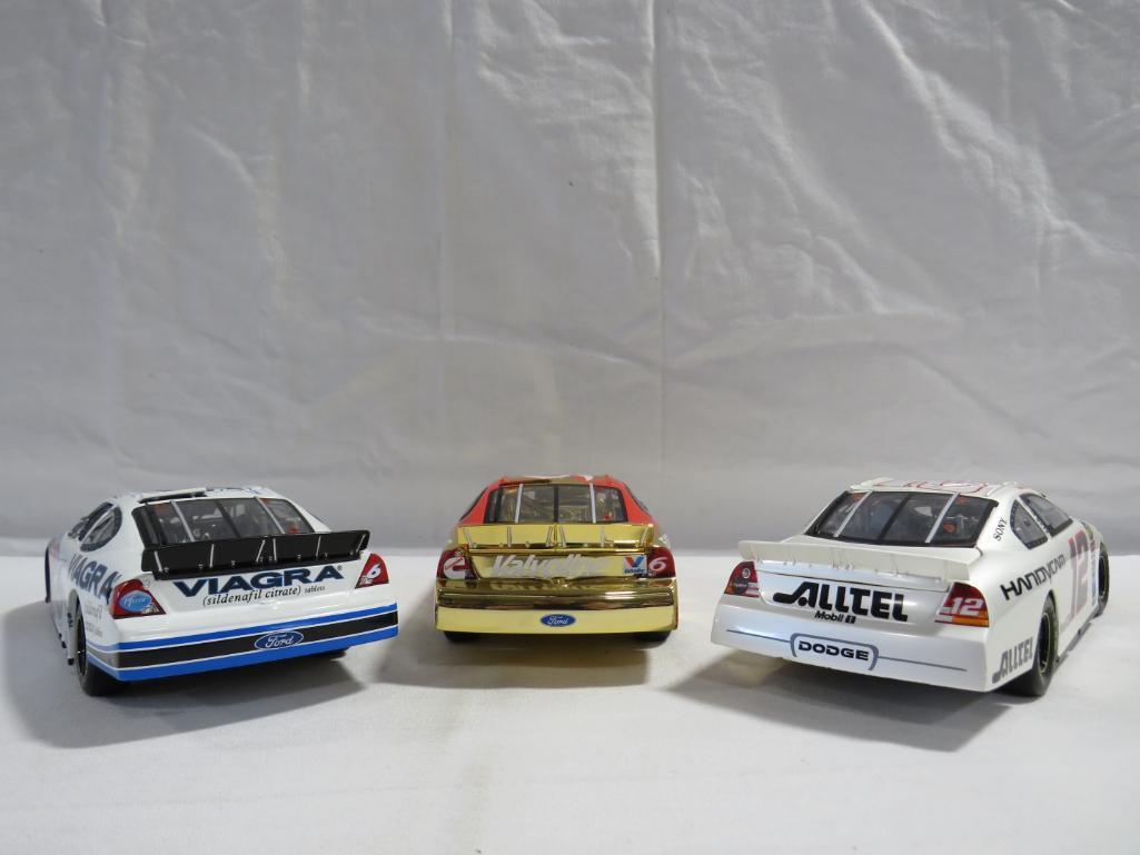 (3) Team Caliber Racing Collectables